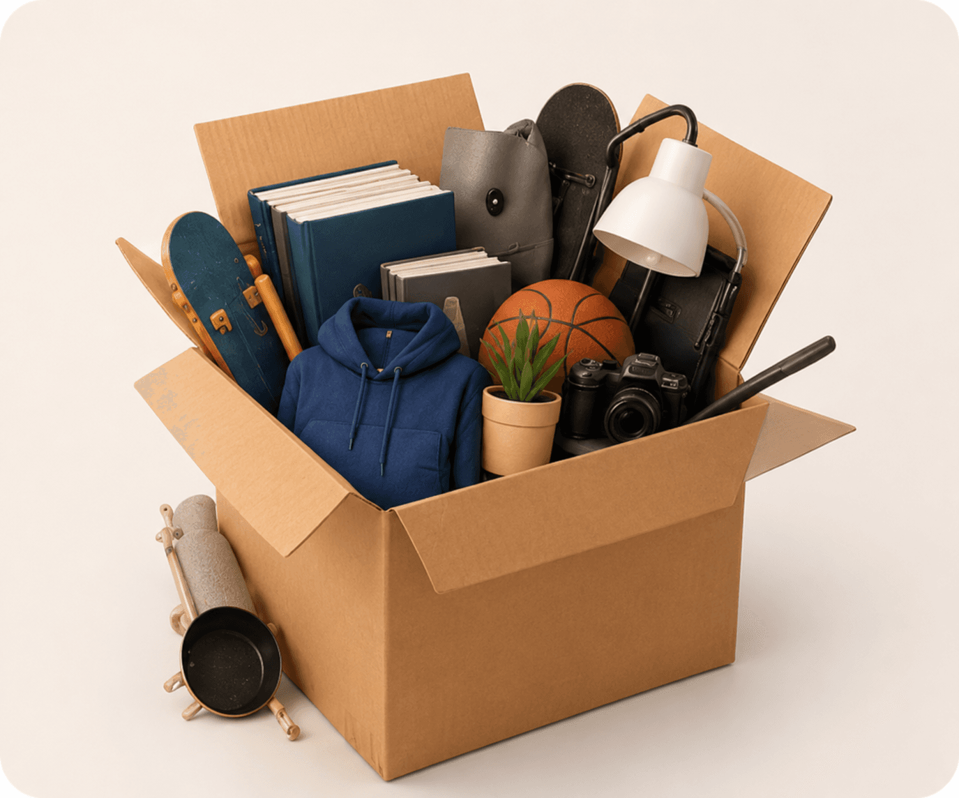 An open Smoves box with books, hoodie, lamp, camera, basketball and other student belongings.